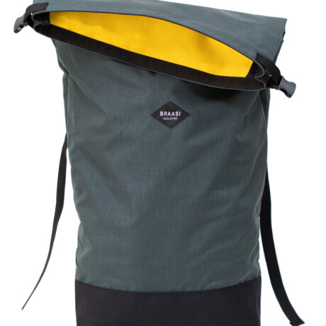 The Braasi Basic Side in gray with yellow inner lining, a high quality backpack made from locally sourced materials.
