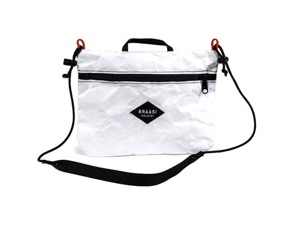 A white Sacoche Braasi bag made out of Tyvek